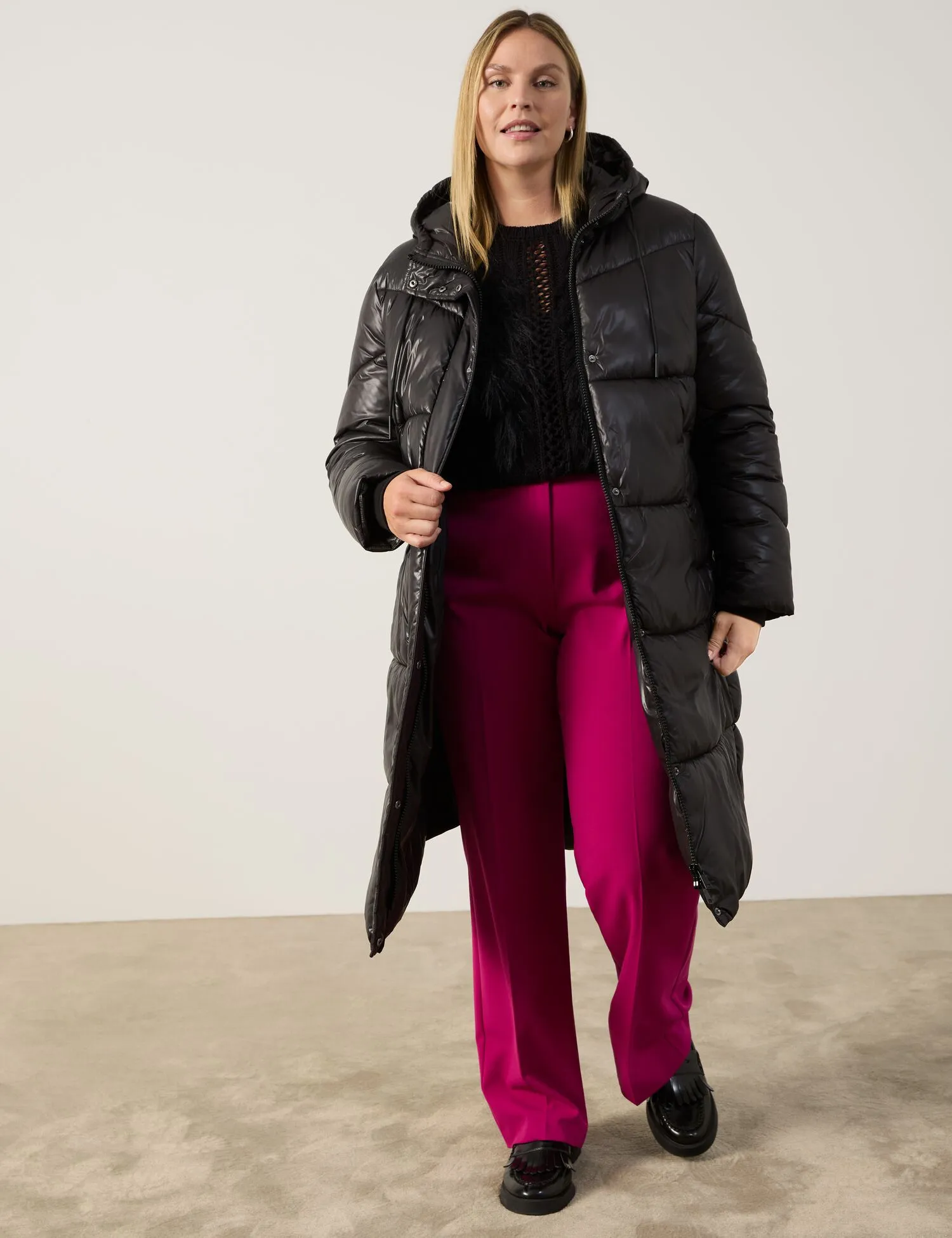 Quilted coat with a rounded hem